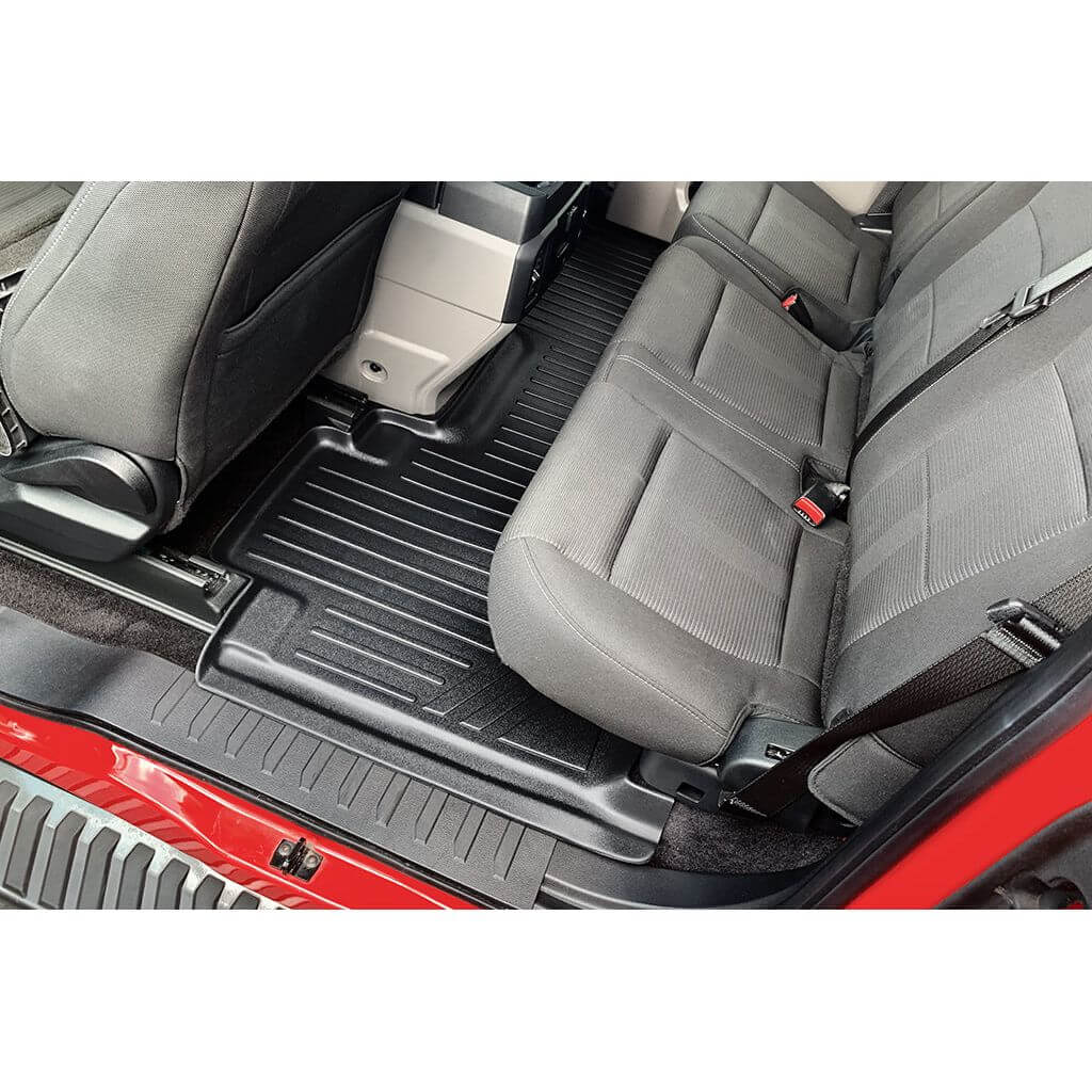 Tapetes SMARTLINER a medida para Ford F-150 SuperCab 2015-2025 con asientos individuales en la primera fila y piso alfombrado.