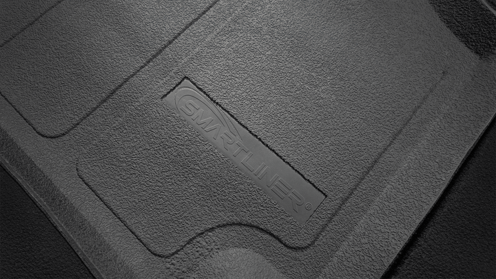 Tapetes SmartCoverage™ a medida para Ford F-150 2015-2025 con asientos individuales en la primera fila y almacenamiento debajo del asiento de la segunda fila OEM (piso de vinilo).